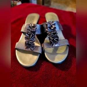 Silver wedge sandals.
